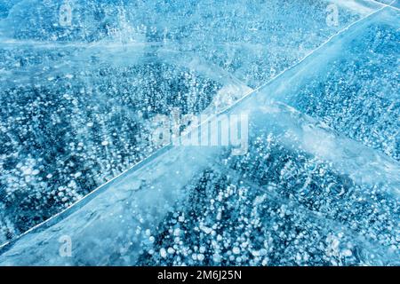 Blue ice and frozen methane bubbles Stock Photo