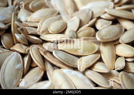Heap of roasted pumpkin seeds. Stock Photo