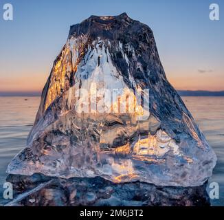 Sunlight refracted in piece of ice Stock Photo