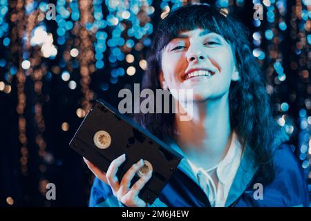 Young sporty woman 80 and 90's style. 90s fashion girl. Stock Photo