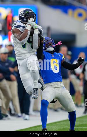 Inglewood, United States. 08th Dec, 2022. Las Vegas Raiders running back  Zamir White (35) and Los Angeles Rams cornerback Derion Kendrick (6)  exchange jerseys after an NFL game on Thursday, Dec. 8