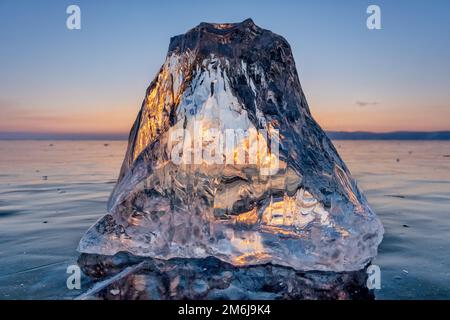 Sunlight refracted in piece of ice Stock Photo