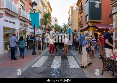 FUENGIROLLA, SPAIN - SEPTEMBER 17, 2022: Spanish traditional riders (caballeros) on the street in Fuengirola, Spain on September 17, 2022 Stock Photo