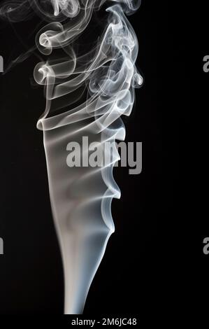 White smoke on black background Stock Photo