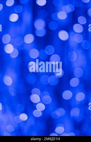 Blue and white holiday bokeh abstract Christmas background Stock Photo