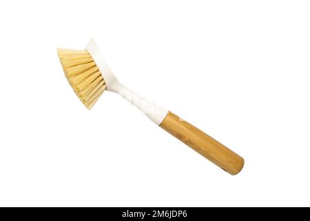 Wooden dish brush with bamboo wood and natural Bristle Tampico Fiber, on white background . Item for cleaning in kitchen. Stock Photo