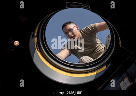 U.S. Air Force Senior Airman Jaryn Jacobs, an aerial gunner with the 4th Special Operations Squadron, participates in a training sortie on an AC-130J Ghostrider, April 27, 2022 at Hurlburt Field, Florida. The 4 SOS regularly performs training sorties on the AC-130J in order to ensure readiness to perform special operations missions any time, any place. Stock Photo