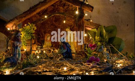 Christmas nativity scene with lights and images Stock Photo