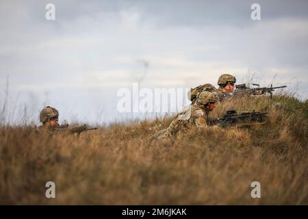 Bemowo Piskie Training Area, Poland. 18th Nov, 2022. U.S. Soldiers assigned to Chaos Company, 3rd Battalion, 8th Cavalry Regiment, 3rd Armored Brigade Combat Team, 1st Cavalry Division (3-1ABCT), operationally controlled by the 1st Infantry Division (1 ID), simulate combat tactics during a live fire exercise rehearsal at Bemowo Piskie, Poland, Nov. 18, 2022. The 3-1 ABCT is among other units assigned to the 1 ID, proudly working alongside NATO allies and regional security partners to provide combat-credible forces to V Corps, America's forward deployed corps in Europe. (Credit Image: © Ke Stock Photo