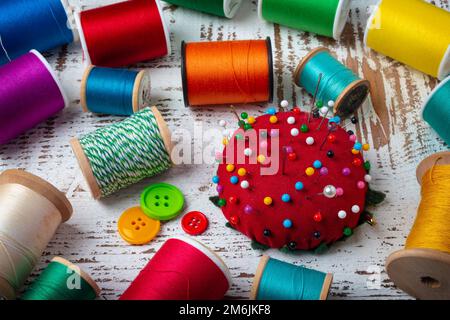 Pinchurshin And Thread With Buttons Still Life Stock Photo