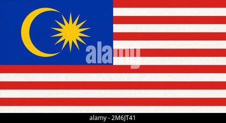 Flag of Malaysia. Malaysian flag on fabric surface Stock Photo