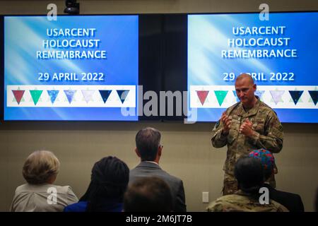 U.S. Army Central's Deputy Commanding General, Maj. Gen. Wendul Hagler II, thanks the South Carolina Council on the Holocaust for their support and insight during USARCENT's Holocaust Days of Remembrance event at Patton Hall on Shaw Air Force Base, S.C., April 29, 2022.. Stock Photo