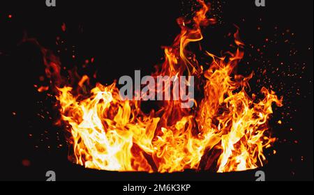 Fire burning at night camp fire burning flames Stock Photo - Alamy