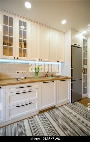 Cozy well designed modern kitchen interior design Stock Photo - Alamy