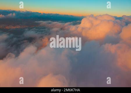 Flying in amazing clouds . Twilight and colorful clouds Stock Photo