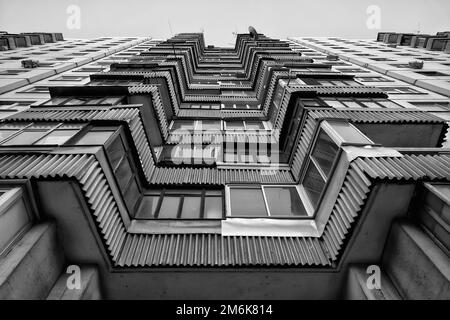 An amazing divercity of windows and balconies on a residential building Stock Photo