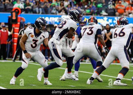 Denver Broncos running back Latavius Murray (28) walks on the sidelines  before the second half of an NFL football game against the Tennessee Titans  Sunday, Nov. 13, 2022, in Nashville, Tenn. (AP