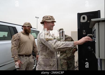 Canadian Army Master Warrant Officer Martin Blais, vehicle fleet manager, Osh-Swa, Joint Task Force-IMPACT, enters his vehicle’s license plate number in a new automated fuels service pedestal before pumping gas at Pump 3 at Ali Al Salem Air Base, Kuwait, April 29, 2022. The new automated fuels service replaces an outdated process and improves billing and tracking efficiency, speed and accuracy. Stock Photo