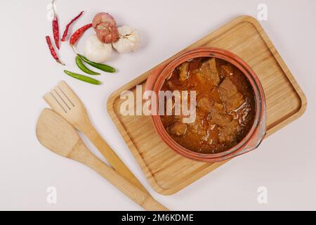 traditional Indian curry lamb masala in a bowl on table  Stock Photo