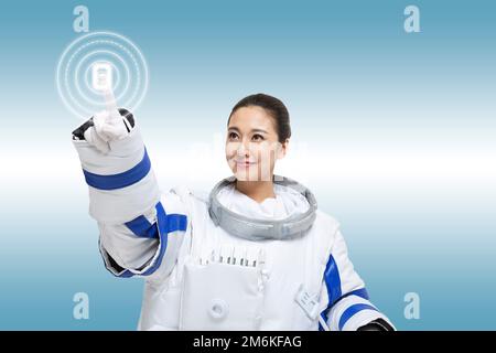 Astronaut and hologram Stock Photo