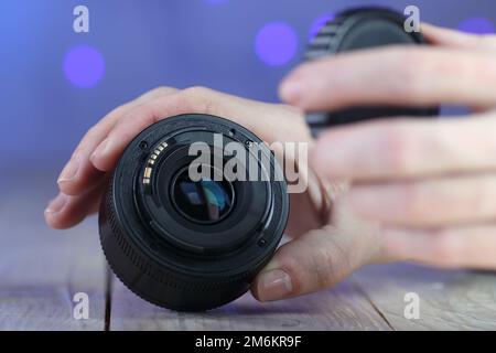 the back of the chinese lens on the table and colored background Stock Photo