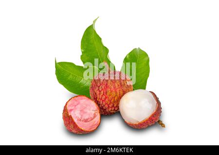 Whole and half ripe lychee with green leaves isolated on white background. Stock Photo