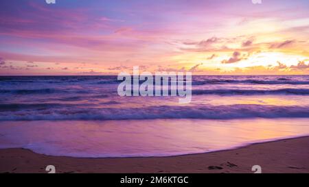 Sunset on the beach of Phuket Thailand Stock Photo