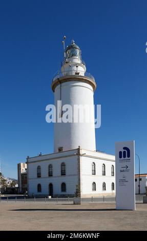 Lighthouse (La Farola De Malaga) at the harbour promenade Muelle uno, Malaga, Spain, Andalusia, Europe. Stock Photo