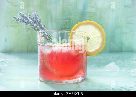 Summer cocktail or mocktail, a cold drink with lemon and lavender Stock Photo