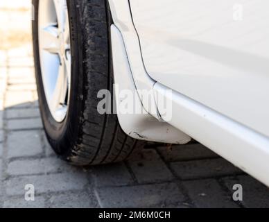 Car front tyre mud guard Stock Photo