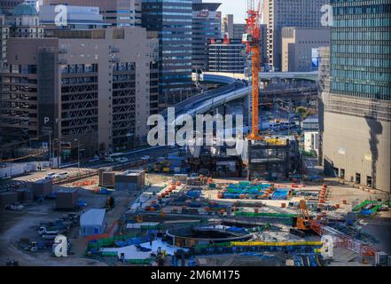 Osaka, Japan - January 3, 2023: Construction site by Gate Tower Building in city center Stock Photo