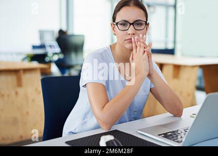 Developing tomorrows tech today. a designer at their workstation in an office. Stock Photo