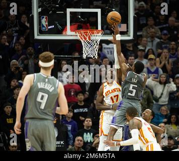 January 4, 2023, Sacramento, CA, USA: Sacramento Kings forward Domantas  Sabonis (10) reacts after dunking the ball over Atlanta Hawks forward  Onyeka Okongwu (17) during a game at Golden 1 Center in