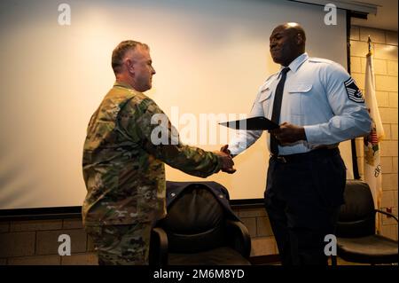 U.S. Air Force Senior Master Sgt. Marlon Burton a group