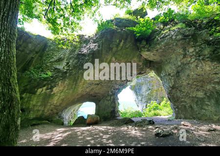 The natural stone bridge or arch at Happurg is a wonder of nature and was formed by erosion. Stock Photo
