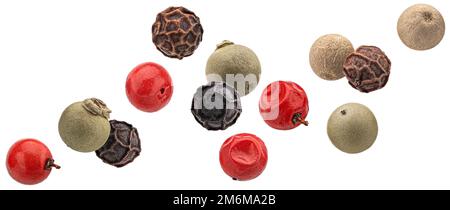 Falling peppercorns isolated on white background Stock Photo