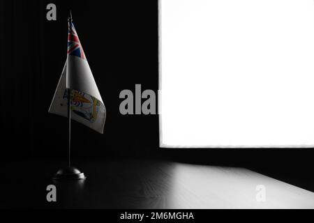 Small national flag of the British Antarctic Territory on a black background. Stock Photo