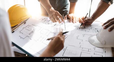 professional architect designer structural engineer team colleagues working office. Architects discussing at the table, team work and work flow Stock Photo