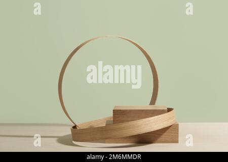 Minimalist wooden scene. Abstract minimal empty stage with rectangle podiums and circles on mint green background. Mockups display for product present Stock Photo