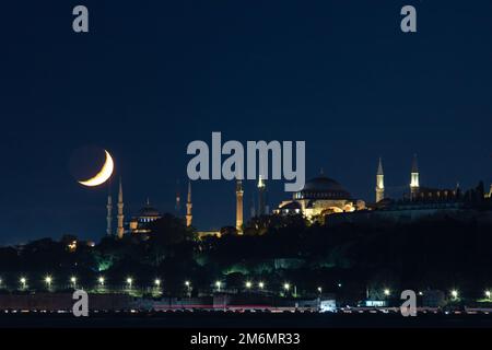 Crescent moon with Sultanahmet and Hagia Sophia mosques in Istanbul ...