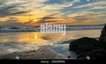 Wispy clouds fill the sunset over Venice Beach in Los Angeles, CA Stock ...