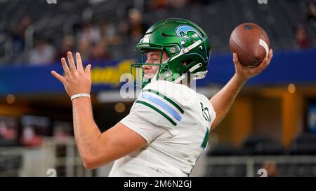 Tulane quarterback Michael Pratt (7) warms up before the American Athletic Conference championship NCAA college football game against Central Florida in New Orleans, Saturday, Dec. 3, 2022. (AP Photo/Matthew Hinton)