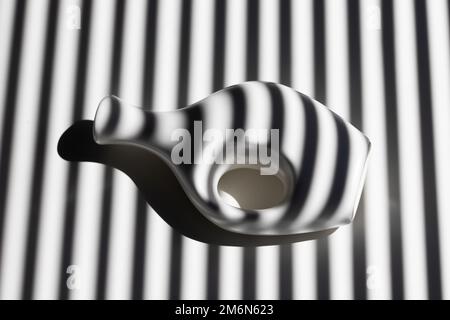 White vase and white flower on abstract background Stock Photo
