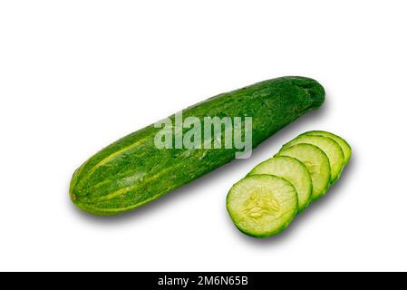 Fresh green cucumber whole and sliced isolated on white background. Stock Photo