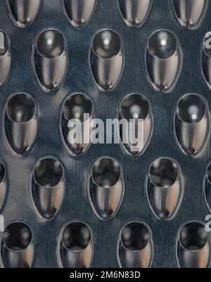 Macro shot of a cheese grater. Stock Photo