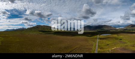 Drone panorama landscape of Connemara National Park and the Twelve Bens mountains in western Ireland Stock Photo