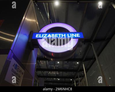 London Elizabeth Line Roundel at night Stock Photo - Alamy