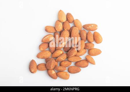 Heap of salted almonds on white background Stock Photo