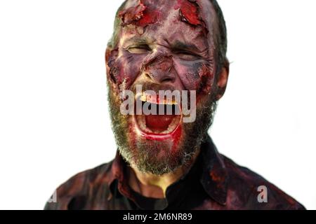 Zombie male makeup for halloween concept. Blood on skin face Stock Photo