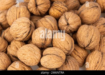 Walnut Withour Shell Set of three walnuts in shell and without. Isolated on white background ...